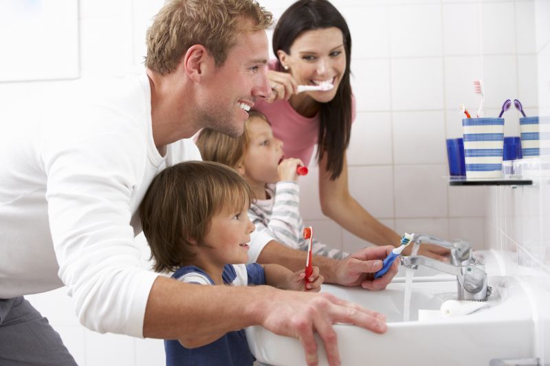 Family Brushing Teeth img